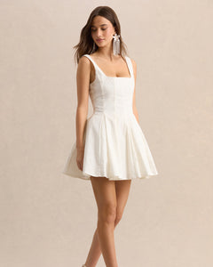 Blanc Manon white square-neck mini dress, detail of the seamed bodice and straps