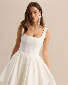 Blanc Manon white mini dress, side view showing the full skater skirt
