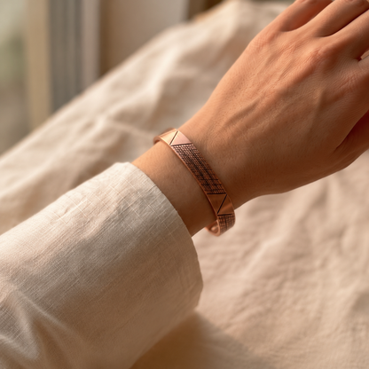 Cuivre Clémence geometric copper cuff bracelet worn on the wrist