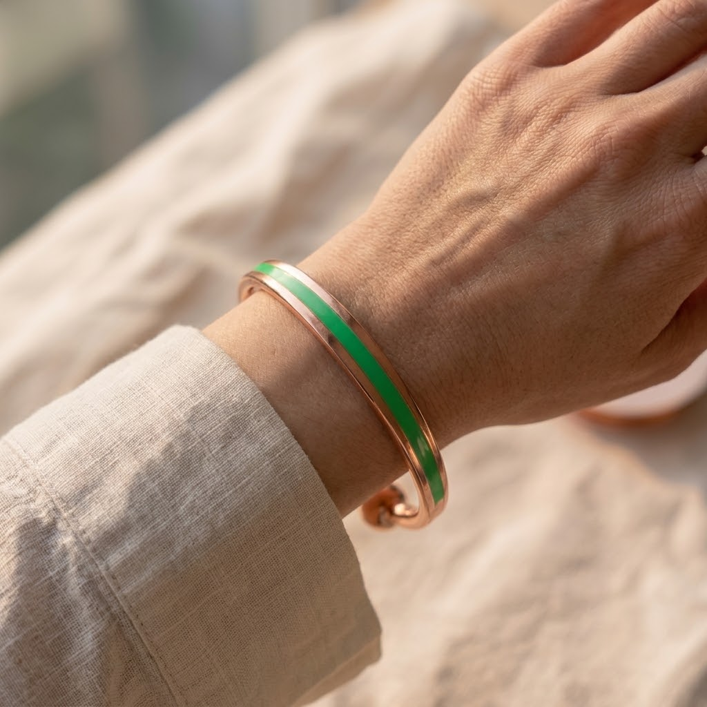 Cuivre Hortense green enamel copper cuff bracelet worn on the wrist